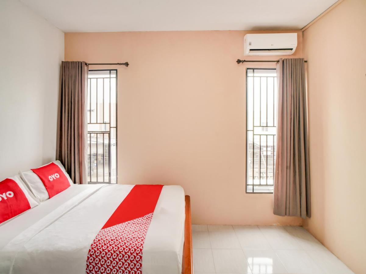 Oyo 90024 Botania Homestay & Cafe Nongsa Esterno foto